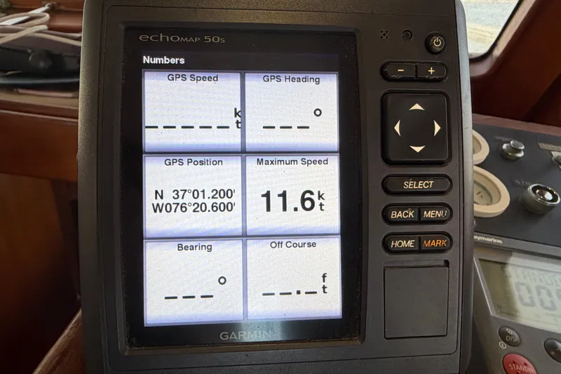 Slide: The Image of Garmin GPS display on 1985 Albin 36 Trawler showing speed and position data. - 32