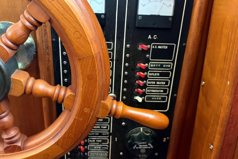 Slide: The Image of Wooden helm and control panel of 1985 Albin 36 Trawler boat. - 40