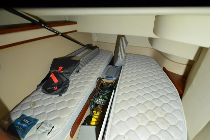 Slide: The Image of Interior of 1999 Cruisers Yachts 3585 Flybridge with storage and equipment. - 22