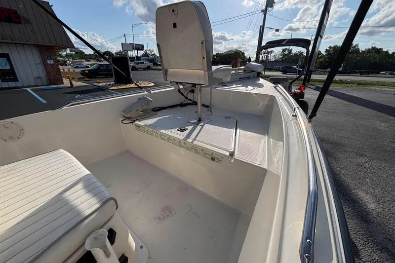 Slide: The Image of 2000 Key West 1720 Center Console boat interior with seating and controls. - 12