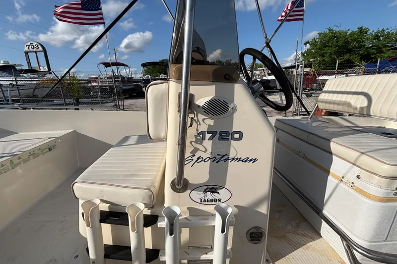 Slide: The Image of 2000 Key West 1720 Center Console boat interior with seating and steering wheel. - 22
