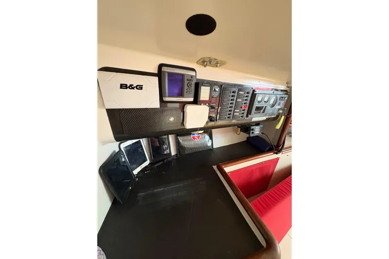 Slide: The Image of Control panel of a 1999 Laurie Davidson TP-52 yacht with navigation instruments. - 7