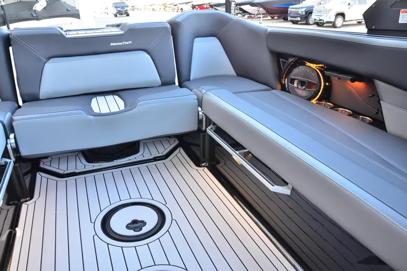 Slide: The Image of 2024 MasterCraft XStar S interior with sleek seating and modern design elements. - 11