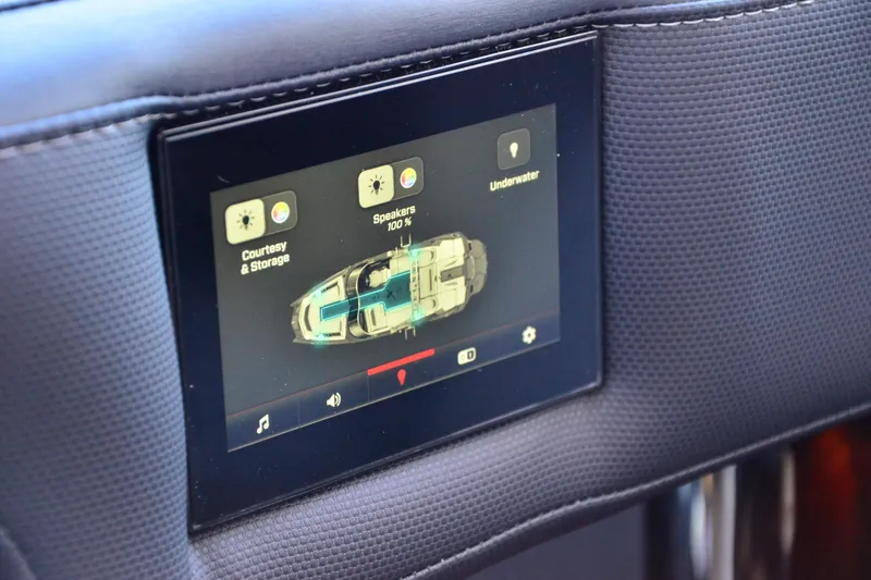 Slide: The Image of Touchscreen control panel in 2024 MasterCraft XStar S boat interior. - 15