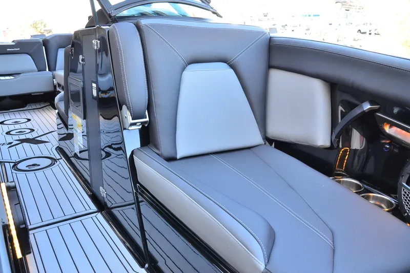Slide: The Image of 2024 MasterCraft XStar S interior with sleek seating and modern design elements. - 8