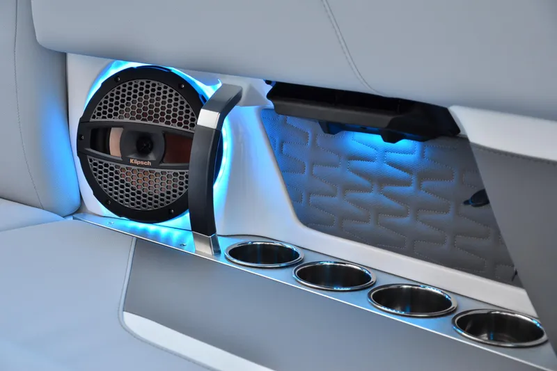Slide: The Image of 2024 MasterCraft X22 interior with Klipsch speaker and illuminated cup holders. - 14