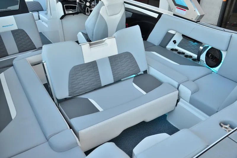 Slide: The Image of 2024 MasterCraft X22 interior with luxurious seating and modern design features. - 16