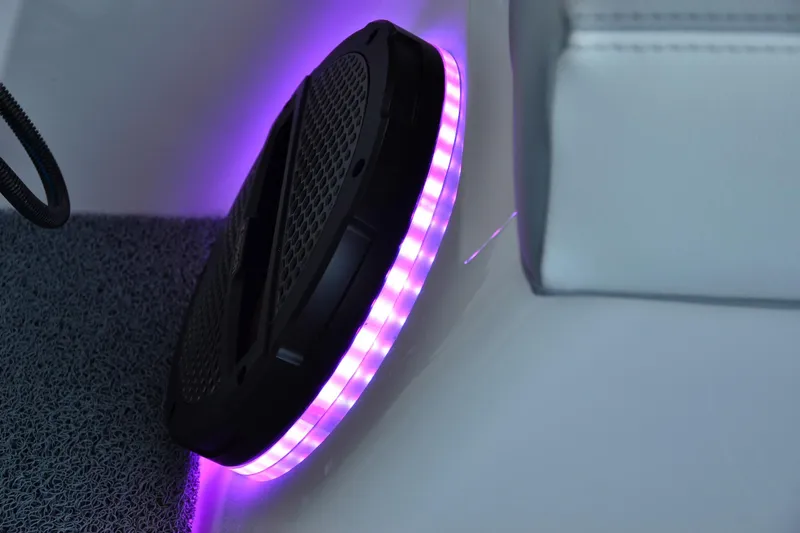 Slide: The Image of 2024 MasterCraft X22 boat speaker with purple LED lighting. - 20