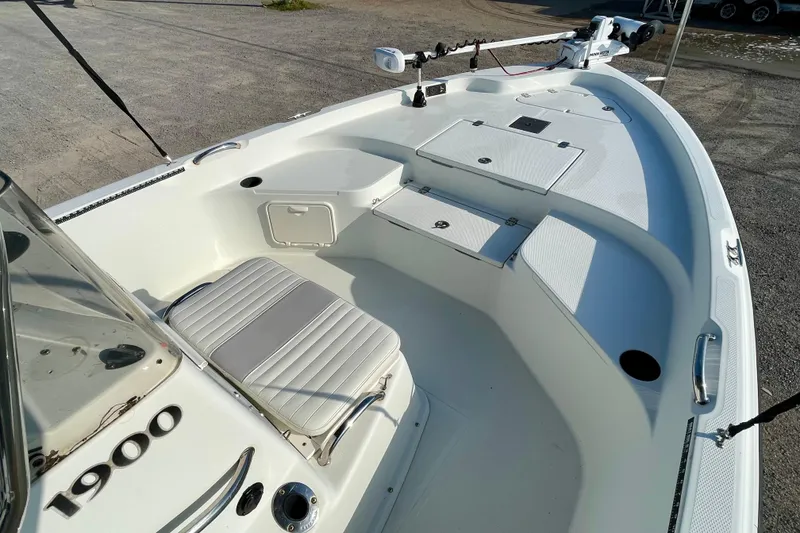 Slide: The Image of 2005 Sailfish 1900 BB Bay Boat with seating and storage compartments, ideal for fishing trips. - 13