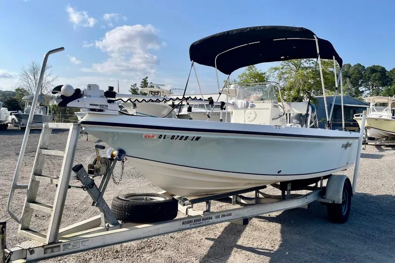 Slide: The Image of 2005 Sailfish 1900 BB Bay Boat on trailer, featuring Minn Kota trolling motor. - 3