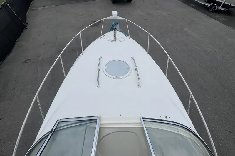 Slide: The Image of 2008 Larson Cabrio 260 boat deck, featuring a sleek design and spacious layout. - 55