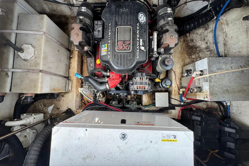 Slide: The Image of Engine compartment of a 2008 Larson Cabrio 260 boat with Volvo Penta 5.7 GXI engine. - 63