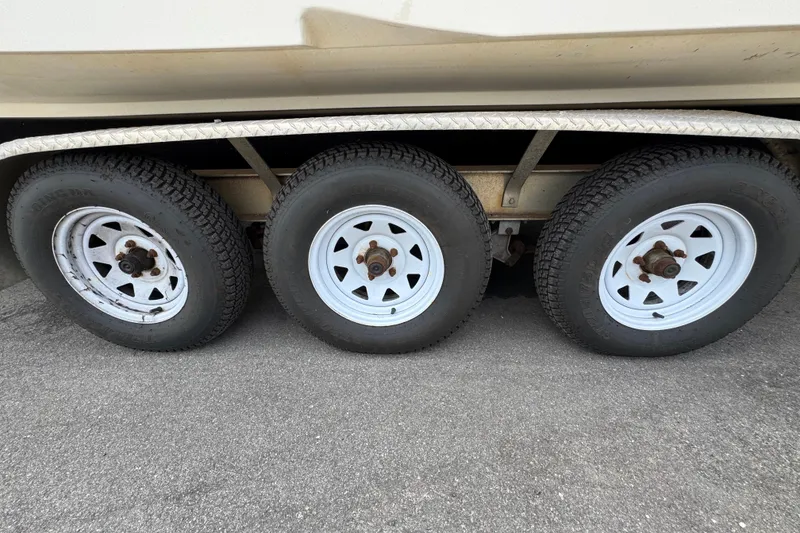 Slide: The Image of Triple axle trailer wheels for 2008 Larson Cabrio 260 boat. - 66