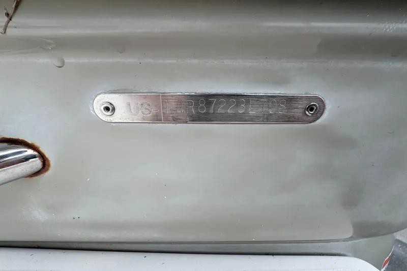 Slide: The Image of 2008 Larson Cabrio 260 boat identification plate with serial number. - 67