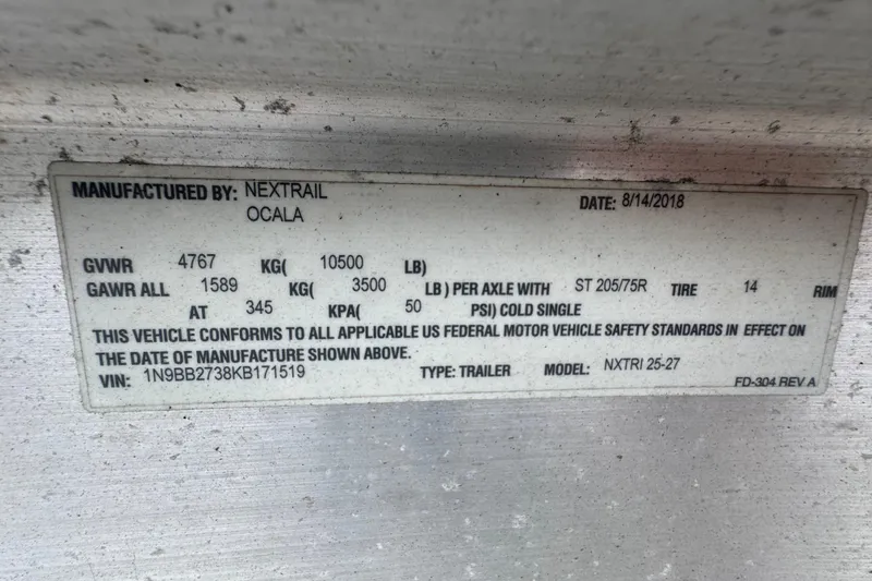 Slide: The Image of Label on trailer manufactured by Nextrail, Ocala, dated 8/14/2018, with specifications. - 68