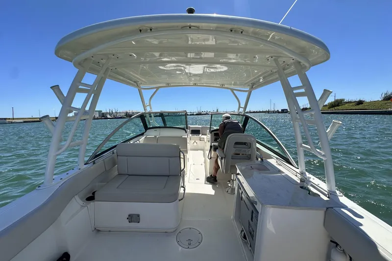 Slide: The Image of 2017 Boston Whaler 270 Vantage boat cruising on a sunny day. - 24