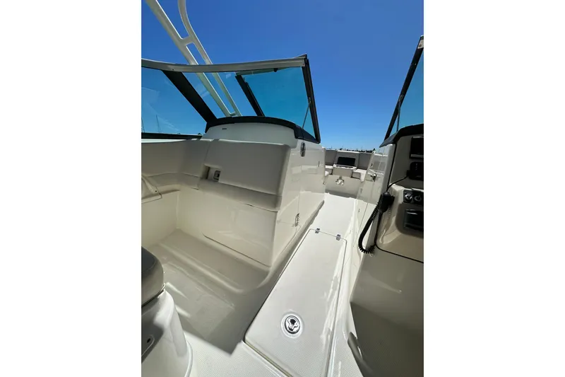 Slide: The Image of 2017 Boston Whaler 270 Vantage boat interior with sleek design and spacious seating. - 26