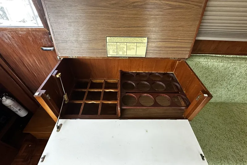 Slide: The Image of Wooden storage compartment on a 1979 Grand Banks 42 Classic boat. - 45