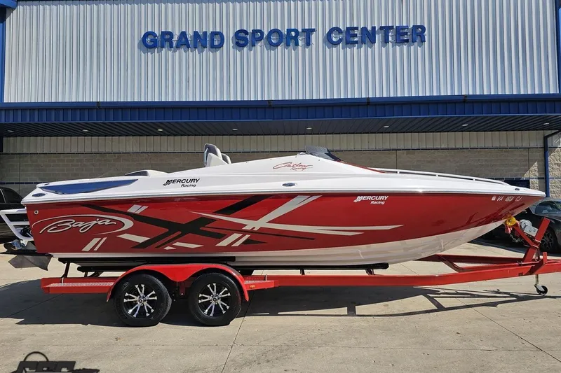 Slide: The Image of 2018 Baja 24 Outlaw speedboat in red and white at Grand Sport Center. - 3