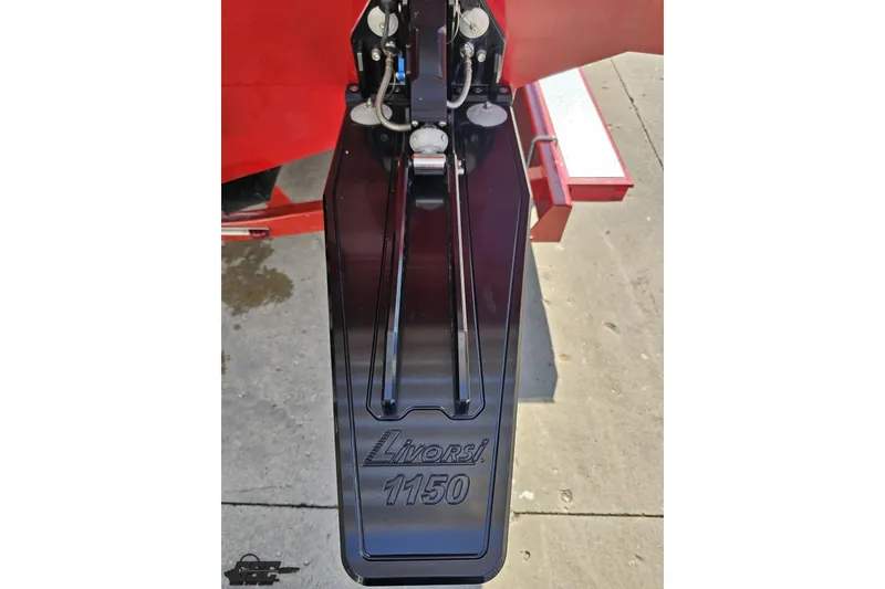 Slide: The Image of Trim tab of a 2018 Baja 24 Outlaw boat with Livorsi 1150 branding. - 31