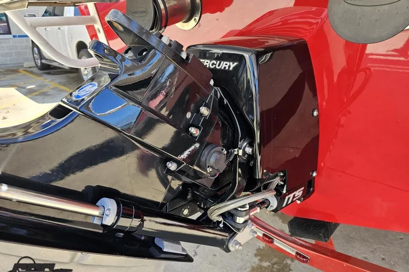 Slide: The Image of Close-up of a 2018 Baja 24 Outlaw boat's Mercury engine component. - 32