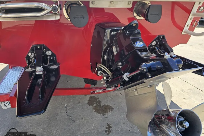 Slide: The Image of 2018 Baja 24 Outlaw boat stern with dual propellers and trim tabs. - 33