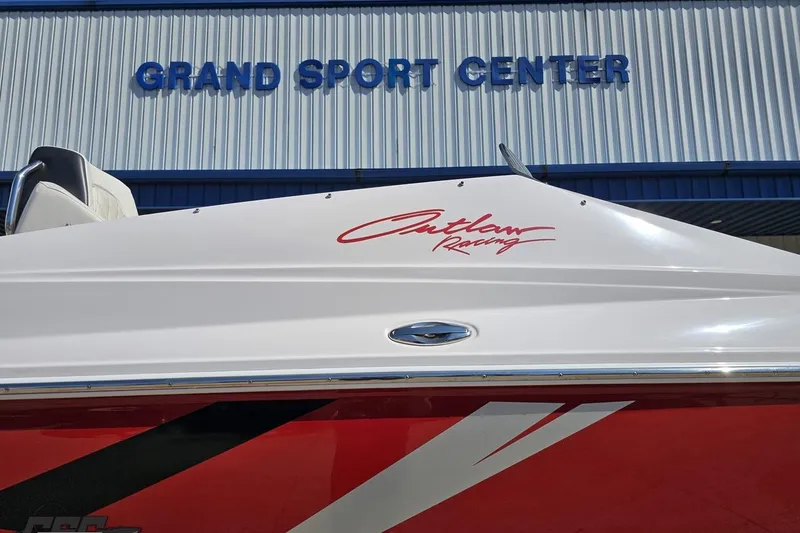 Slide: The Image of 2018 Baja 24 Outlaw boat at Grand Sport Center, featuring sleek design and racing graphics. - 5