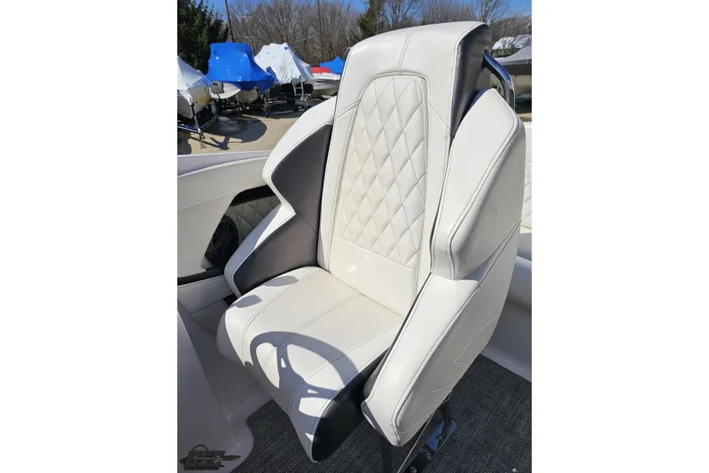 Slide: The Image of Luxurious white seat in 2018 Baja 24 Outlaw boat, featuring diamond stitching. - 66
