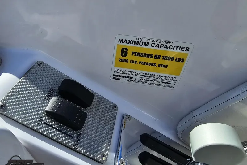 Slide: The Image of 2018 Baja 24 Outlaw boat capacity label, indicating 6 persons or 1600 lbs limit. - 72