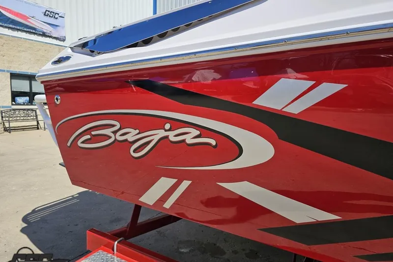 Slide: The Image of Red 2018 Baja 24 Outlaw boat with bold graphics and logo. - 8
