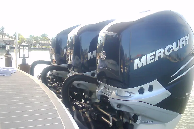 Slide: The Image of Triple Mercury outboard engines on a 2020 Formula 350 Crossover Bowrider boat. - 23