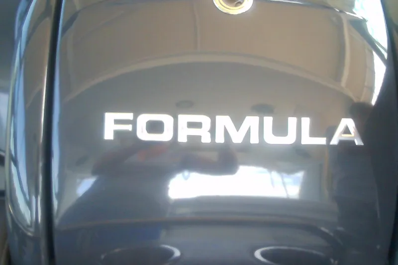 Slide: The Image of 2020 Formula 350 Crossover Bowrider logo on a sleek, reflective surface. - 26