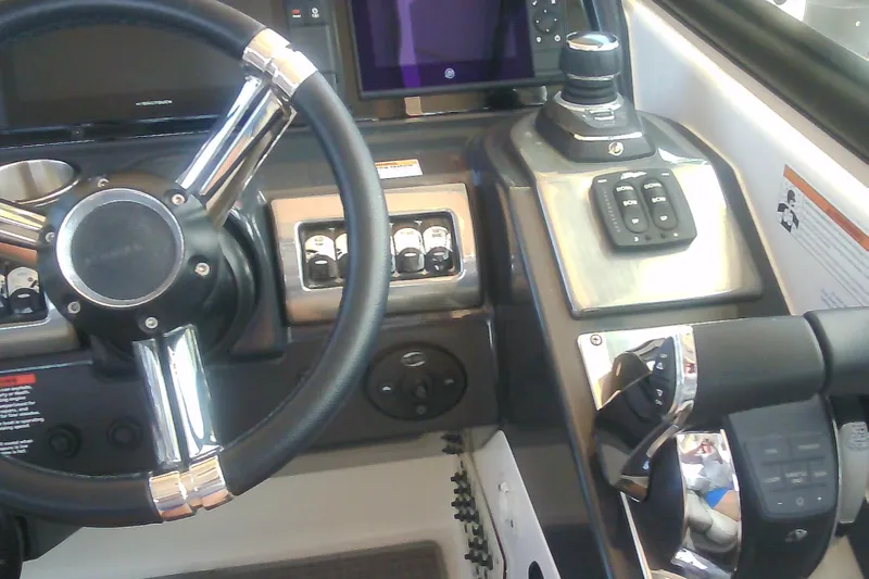 Slide: The Image of 2020 Formula 350 Crossover Bowrider dashboard with steering wheel and controls. - 29