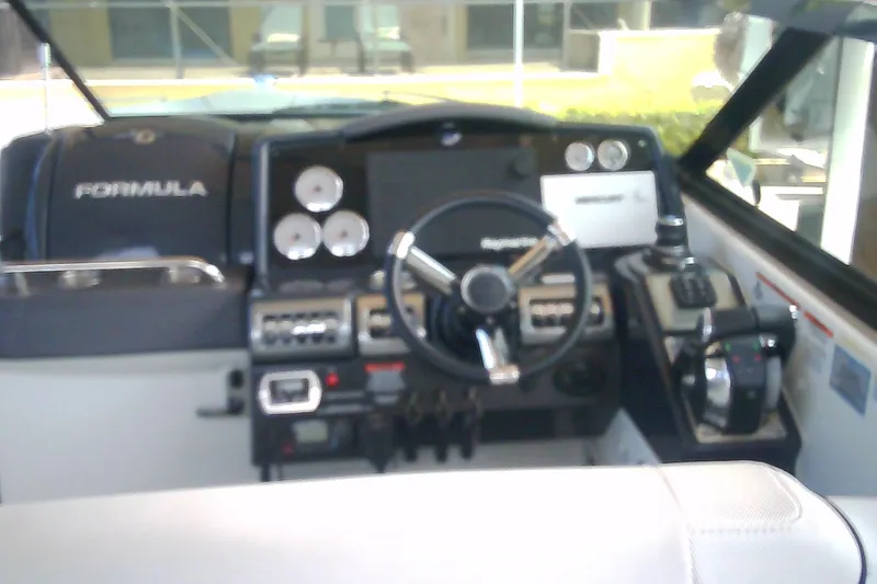 Slide: The Image of 2020 Formula 350 Crossover Bowrider dashboard with steering wheel and control panel. - 30