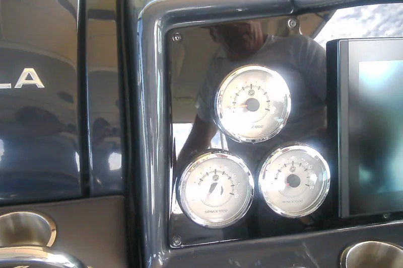 Slide: The Image of Dashboard of a 2020 Formula 350 Crossover Bowrider with gauges and controls. - 32