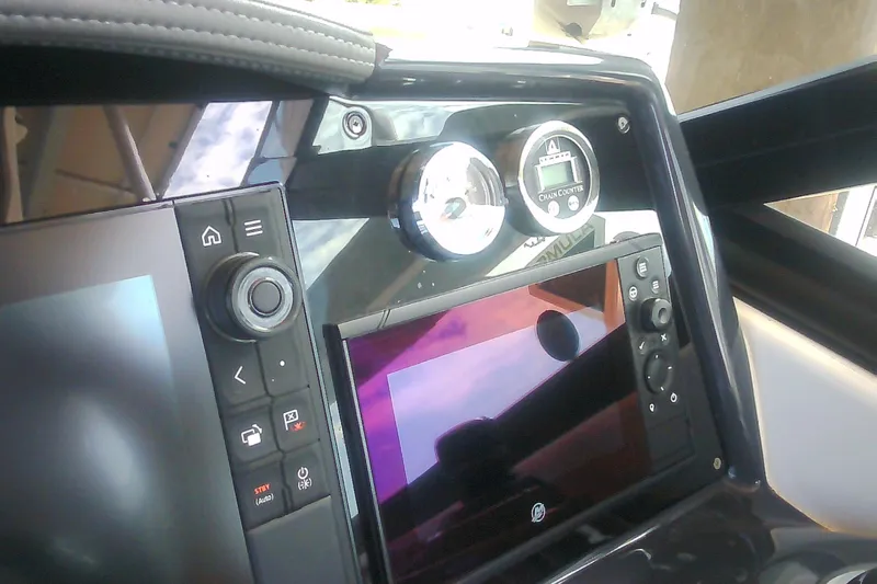 Slide: The Image of Dashboard of 2020 Formula 350 Crossover Bowrider with navigation controls and display. - 34