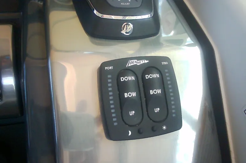 Slide: The Image of Bennett trim tab control panel on 2020 Formula 350 Crossover Bowrider boat. - 39