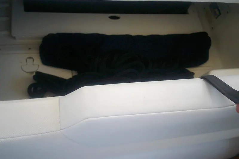 Slide: The Image of Storage compartment in a 2020 Formula 350 Crossover Bowrider boat. - 44
