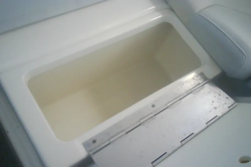Slide: The Image of Open storage compartment in 2020 Formula 350 Crossover Bowrider boat. - 45