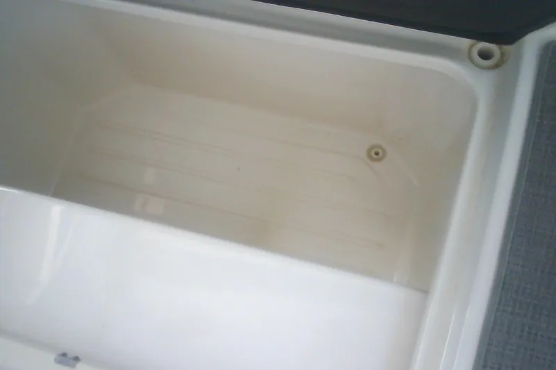 Slide: The Image of Storage compartment in a 2020 Formula 350 Crossover Bowrider boat. - 46