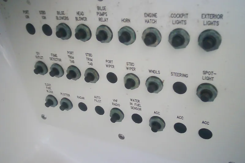 Slide: The Image of Control panel of a 2020 Formula 350 Crossover Bowrider with various switches. - 48