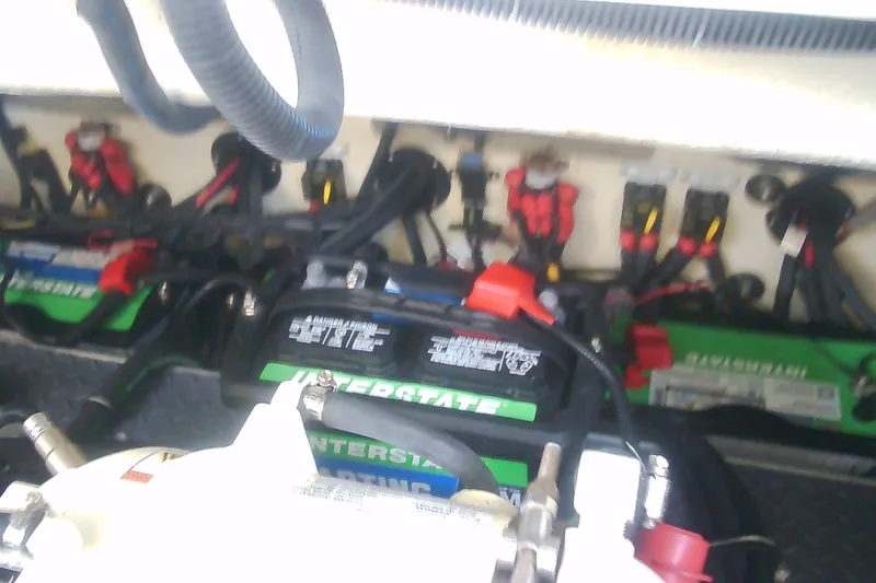 Slide: The Image of Battery compartment of a 2020 Formula 350 Crossover Bowrider with multiple Interstate batteries. - 52