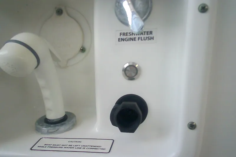 Slide: The Image of Freshwater engine flush system on 2020 Formula 350 Crossover Bowrider boat. - 53