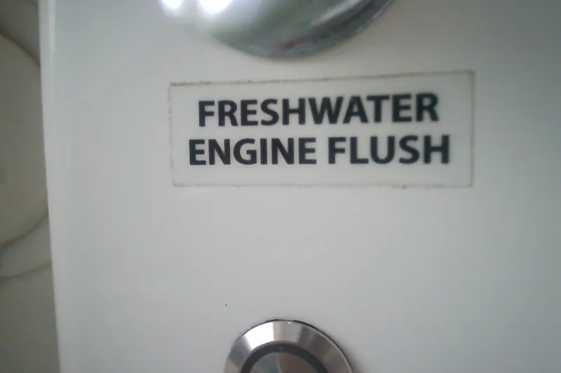 Slide: The Image of Freshwater engine flush label on 2020 Formula 350 Crossover Bowrider boat. - 54