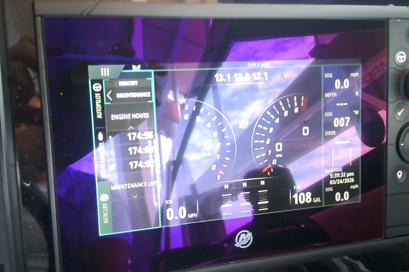 Slide: The Image of Dashboard display of a 2020 Formula 350 Crossover Bowrider boat showing engine metrics. - 55