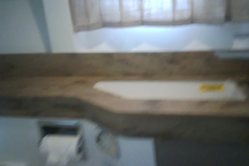 Slide: The Image of Blurry interior view of a 2020 Formula 350 Crossover Bowrider boat. - 59