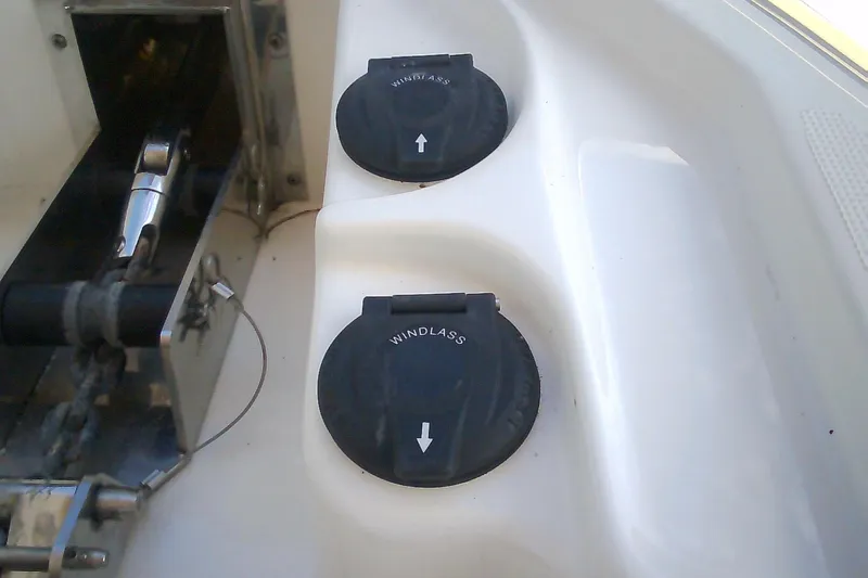 Slide: The Image of Windlass controls on a 2020 Formula 350 Crossover Bowrider boat deck. - 66