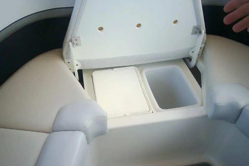 Slide: The Image of 2020 Formula 350 Crossover Bowrider interior storage compartment with open lid. - 68