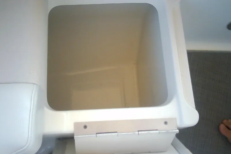 Slide: The Image of Storage compartment in 2020 Formula 350 Crossover Bowrider boat, featuring white interior. - 69
