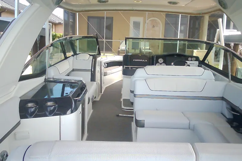 Slide: The Image of 2020 Formula 350 Crossover Bowrider interior with luxurious seating and modern dashboard. - 70